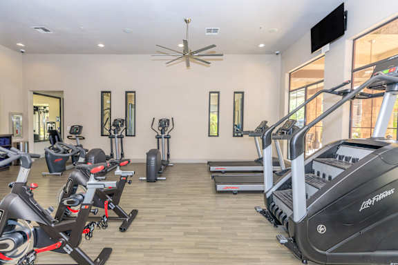 Gym with treadmills and other exercise equipment at The Presidio by Picerne, Nevada