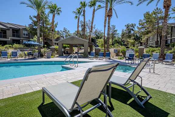 Poolside Lounge Chairs at The Summit by Picerne Apartments, Henderson, NV, 89052