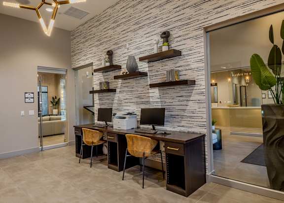 Resident business center with two computer work stations and printer at Level 25 at The Curve by Picerne, Las Vegas, NV