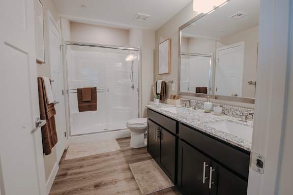 Spacious Bathrooms with shower at Level 25 at The Curve by Picerne, Las Vegas, Nevada