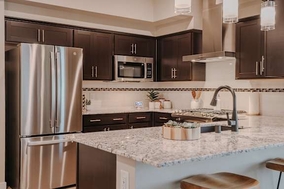 Amazing kitchens with modern appliances at Level 25 at The Curve by Picerne, Las Vegas