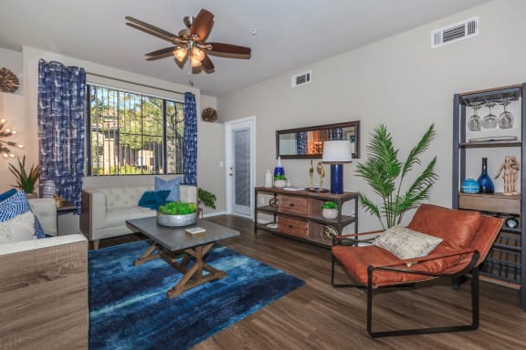 Large Living Room With Ceramic Tile Flooring at The Preserve by Picerne, N Las Vegas, NV