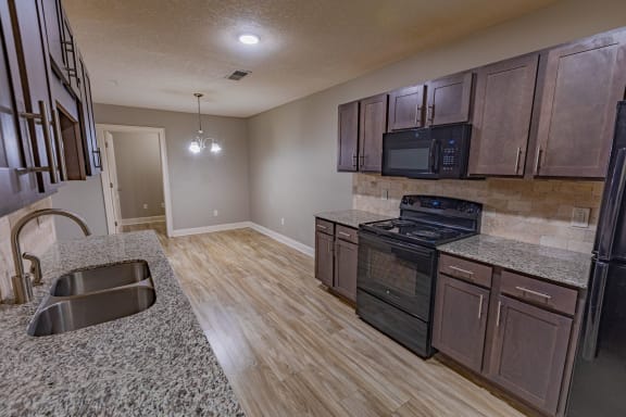 Kitchen Area at Parkside Grand Apartments in Pensacola, FL