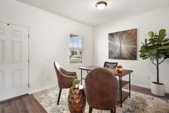 the dining area with chairs  and bright light