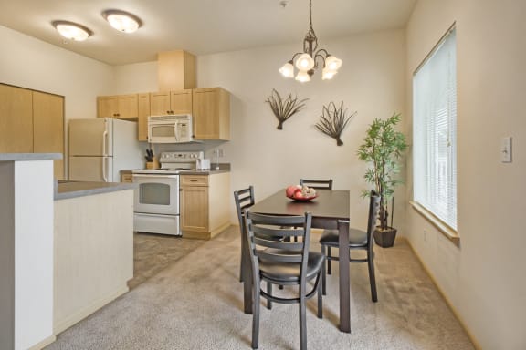 Kitchen with dining area at Ultris Madison, Olympia, WA,98513