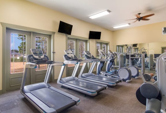 Cardio equipment at the fitness center in Wynnfield Lakes apartments in Jacksonville, FL