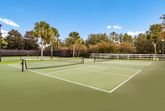 Two green pickleball courts at Wynnfield Lakes apartments in Jacksonville, FL
