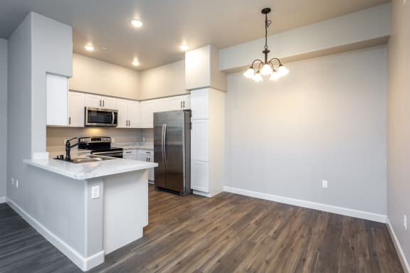 a kitchen and living room in a house
