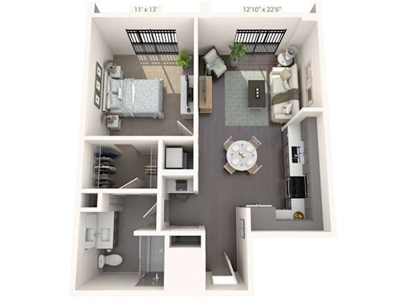 A floor plan of a small apartment with a bedroom, living room, and bathroom.
