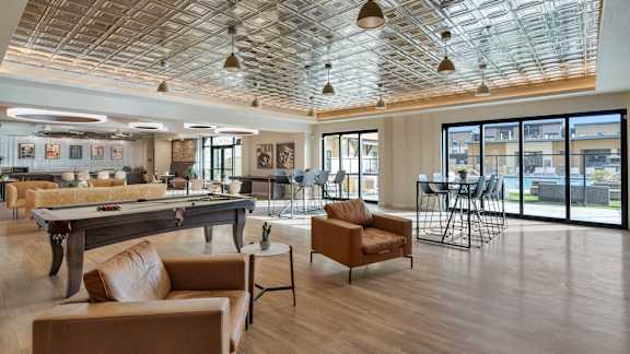 Community area with a glass ceiling and a dining area at Solace at Ballpark Village, Arizona  , 85338