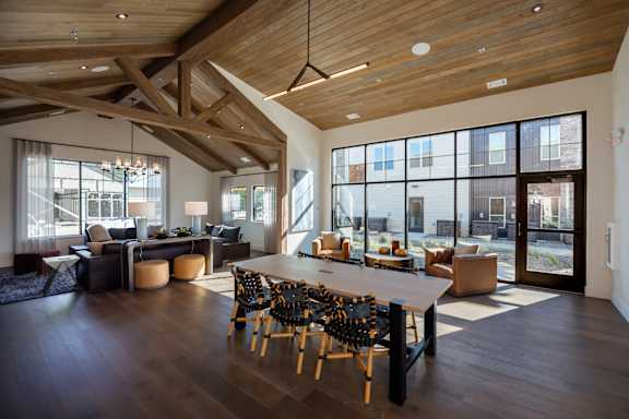A large room with a long table and chairs at The Crossings  at Windsong, Prescott Valley, 86314