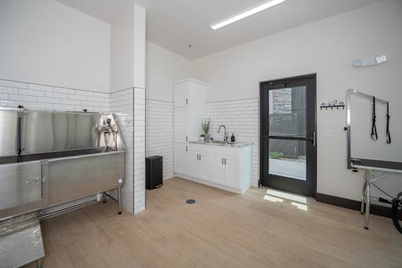 A kitchen area with a sink and a bicycle at The Crossings  at Windsong, Prescott Valley, 86314