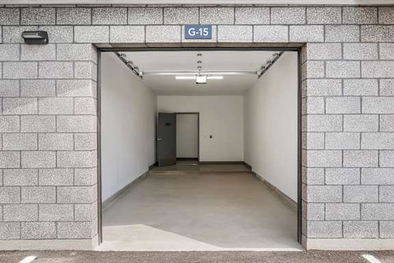 Private garage unit with interior access door at Lucero Apartments, Phoenix, AZ 85051