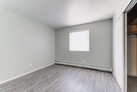 Beautiful Bright Bedroom With Wide Windows at Johnson Legacy Apartments, Wisconsin