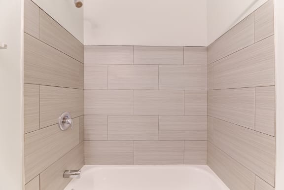 Large Soaking Tub In Master Bathroom at Johnson Legacy Apartments, Milwaukee, WI, 53223