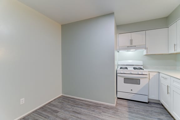 Modern Kitchen With Stainless Steel Appliances And Double Door Refrigerators at Johnson Legacy Apartments, Milwaukee, WI