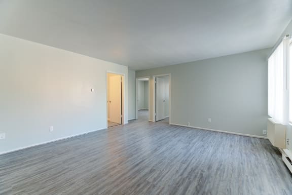 Contemporary Finishes Include Wood And Tile Flooring at Johnson Legacy Apartments, Milwaukee