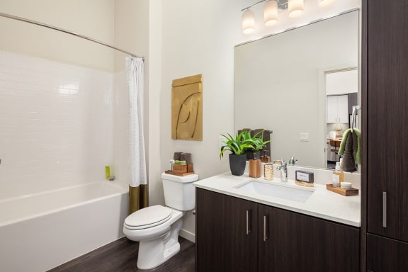 Apartment Bathroom with Shower, Tub, and Sink