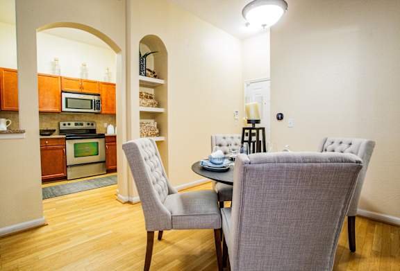 Dining Room Area with Arched Entryway at Phoenix Apartment Near Highway 51
