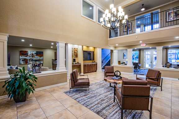 Clubhouse lounge at Dallas apartments with elevators