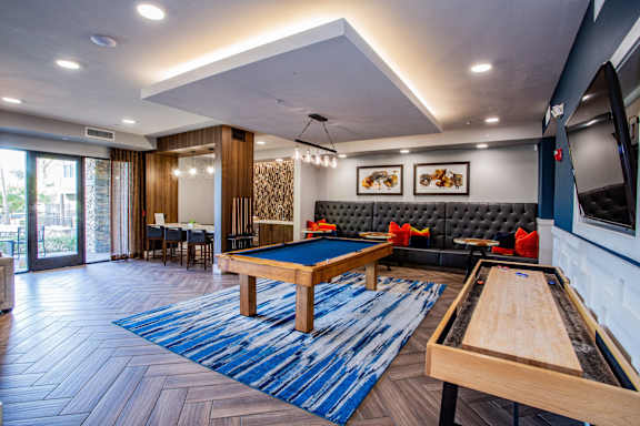 Resident Game Room with Billiards, Shuffleboard and Wall Scrabble at Phoenix Studio Apartments