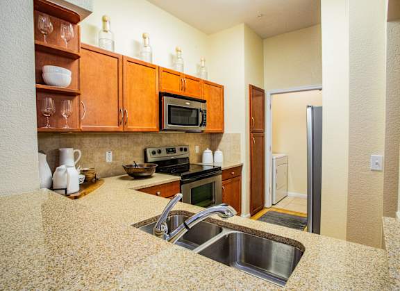 Full Kitchen with Stainless Steel Appliances at Apartments in Paradise Valley