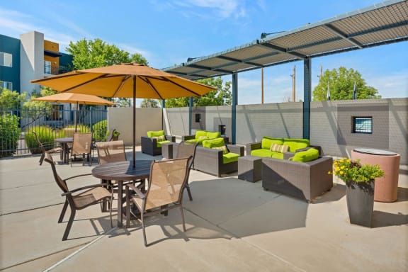 Pool Sundeck with Lounge Chairs and Shade at Ladera Vista Apartments