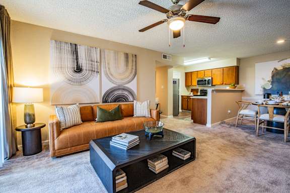 Spacious Living Room with Ceiling Fan at ABQ Apt Rental
