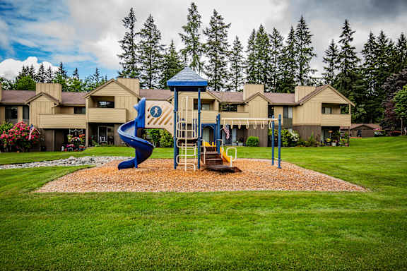 Children's Playground with Slides at Apartments Near Bremerton