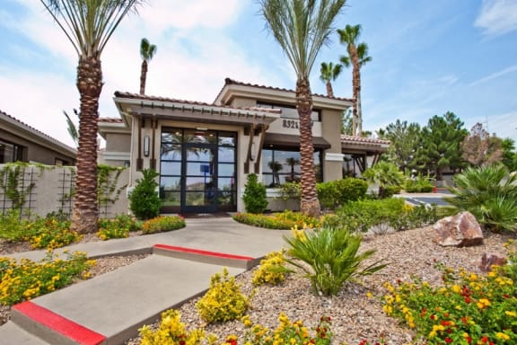 Clubhouse and Leasing Office with Elegant Landscaping at Las Vegas Apartments Near Desert Breeze Park