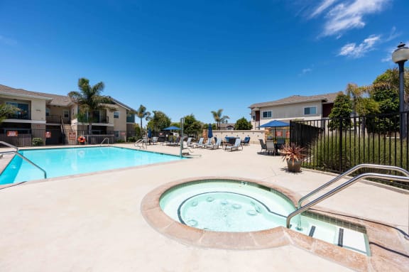 the swimming pool at the preserve at polo apartments tx