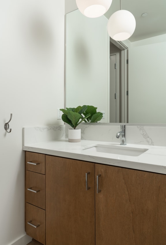 Studio Bathroom with Quartz Counter at Connect, San Luis Obispo