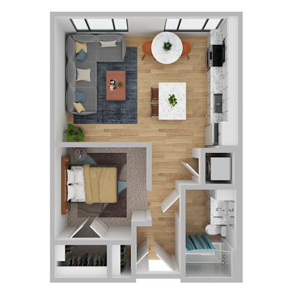 A top-down view of a living room with a grey couch, a coffee table, and a television.