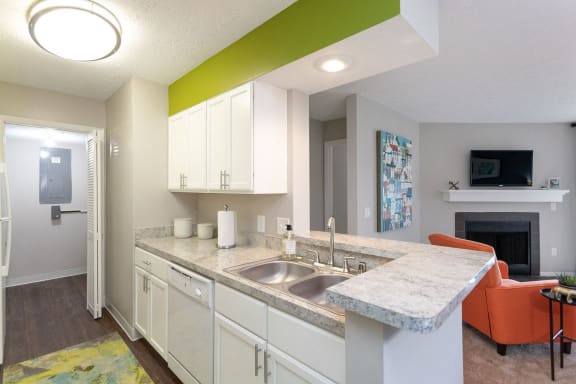 a kitchen with a sink and a counter top at Chinoe Creek Apartments, Lexington, KY, 40502