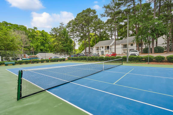 the tennis court at the preserve at ballantyne commons apartments at Lake Johnson Mews, Raleigh, North Carolina