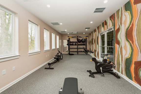 A home gym at The Courtyards of Chanticleer Apartments, Virginia Beach, Virginia