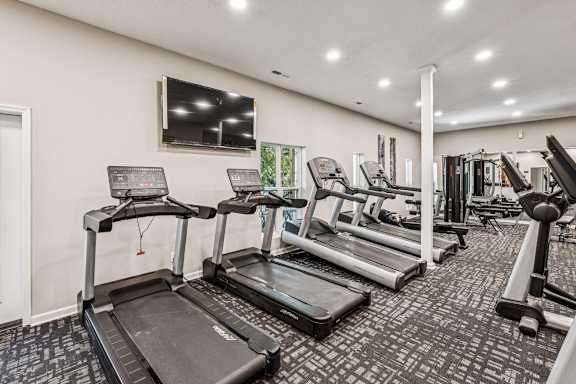 A gym with treadmills and other exercise equipment. at Park Ridge Estates, North Carolina