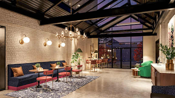 A modern interior with a brick wall and a glass ceiling at The Carousel, Richmond, 23220