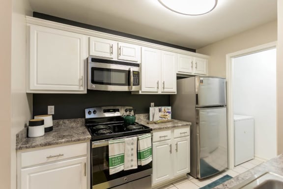 White European style Cabinetry with Brushed Nickel Hardware at The Resort At Lake Crossing Apartments, PRG Real Estate, Lexington