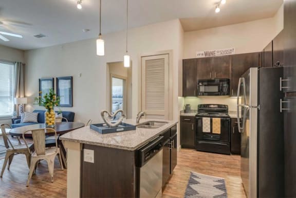 Kitchen Island in Select Units at District at Medical Center, San Antonio, 78229