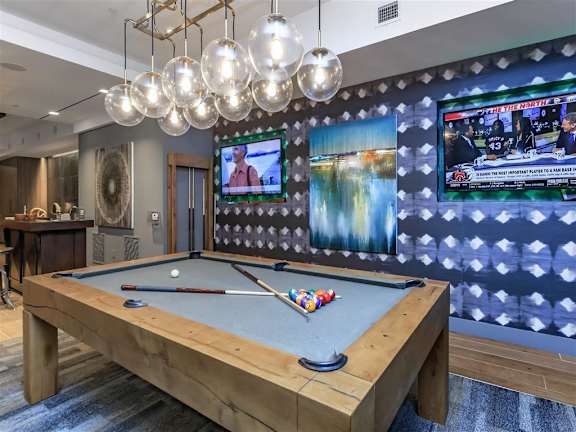 Pool table in the resident lounge at Berewick Pointe Apartments in Charlotte, NC.