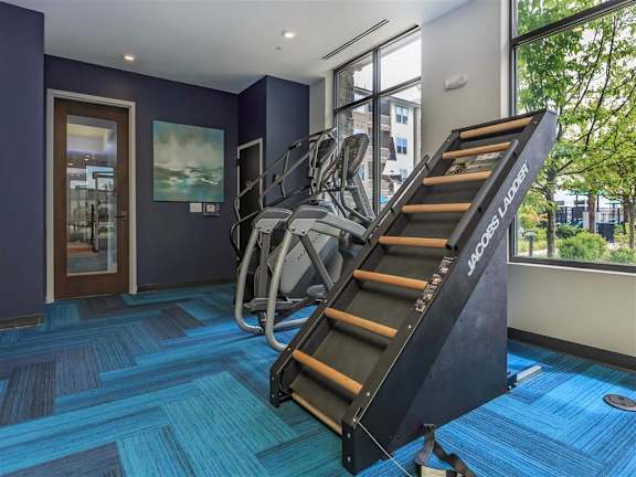 Resident gym has cardio equipment and a Jacobs Ladder at Berewick Pointe Apartments