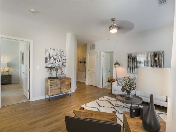 Spacious Living Room With Plank Flooring at Pointe at Prosperity Village Apartments, Charlotte, NC, 28269