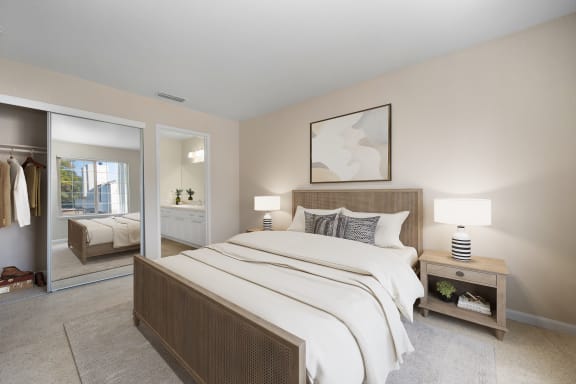 a bedroom with a large bed and a closet