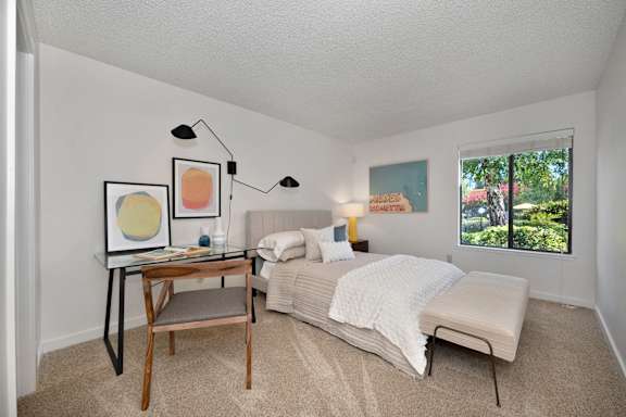 a bedroom with a bed and a desk and a window at Fountains of Fair Oaks, Fair Oaks, CA, 95628