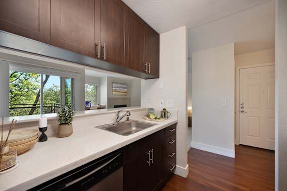 A kitchen with brown cabinets and a white counter top at Folsom Ranch, Folsom, CA, 95630