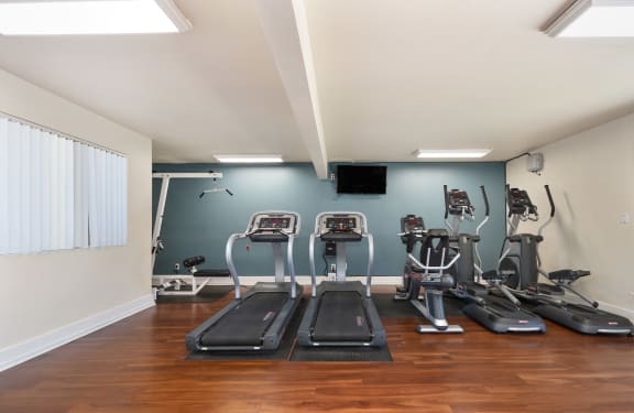 the gym at the shiloh green apartments at Olympus Park Apartments, Roseville, California