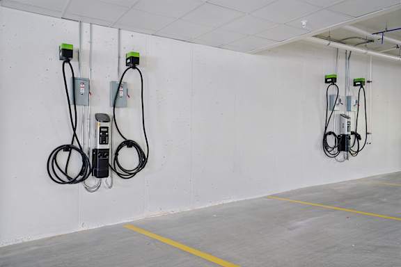 A wall of charging stations for electric vehicles.
