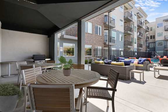 a rendering of a patio with tables and chairs