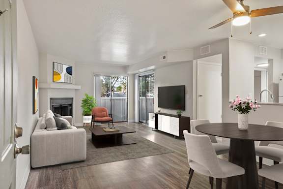 The Living Room with Fireplace at Horizon East Apartments.